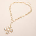 Bold Pearl Cross Pendant Necklace
